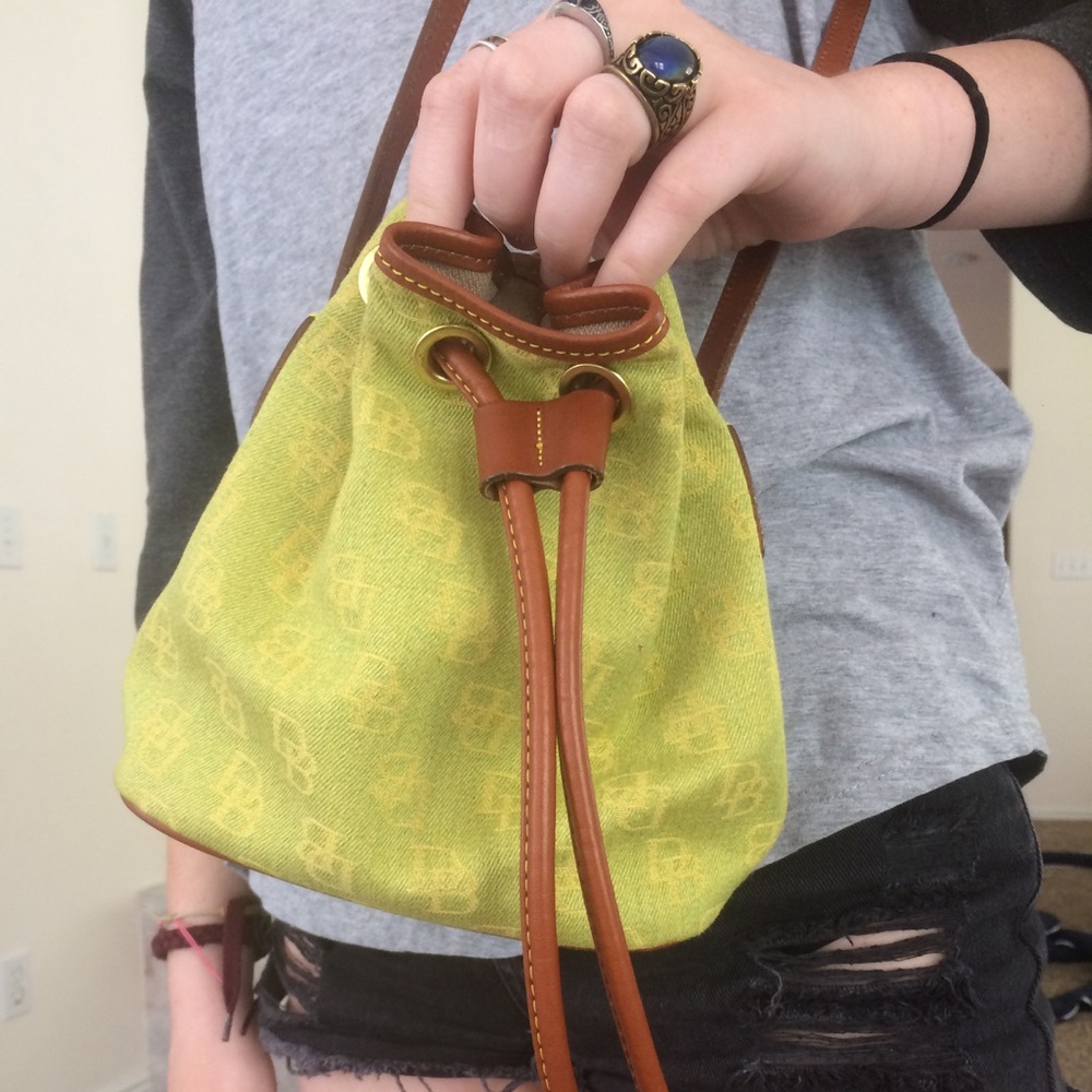 Dooney & Bourke small lime green and brown pursue.